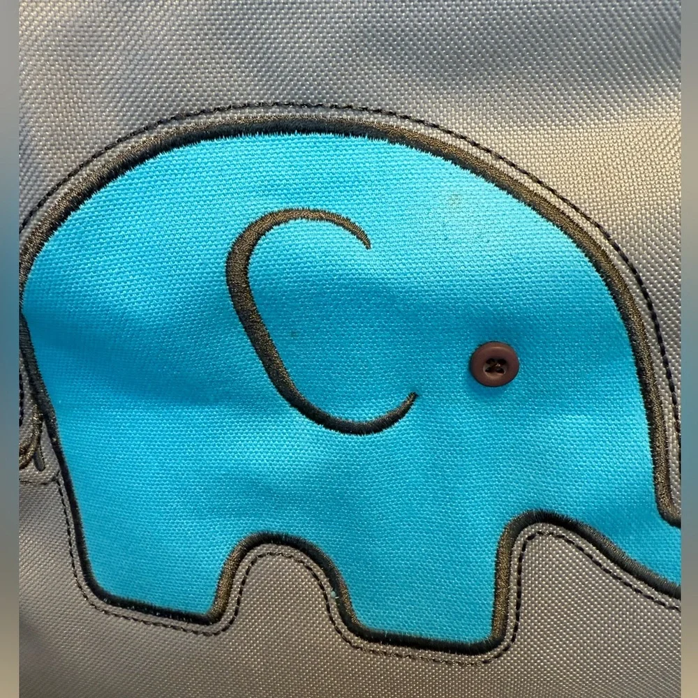 thirty-one small square beige colored tote with brown handles & blue elephant